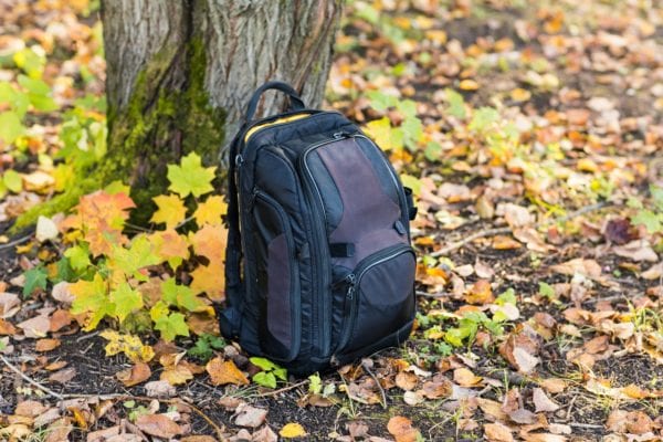 backpack in the woods concept travel tourism